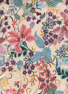 the fabric is colorful and has many flowers on it