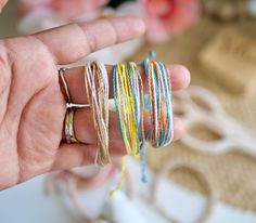 Embrace the bohemian vibes with our beautiful macrame bracelets! Handcrafted with love and attention to detail, these boho-inspired accessories will add a touch of free-spirited charm to any outfit - wear them anywhere... beach, pool, gym, shower. Wear them alone or stacked with others. ✿ Macrame thread: durable, waterproof, does not lose its color ✿ Sliding knot : adjustable and fits most wrist sizes from small to large(message me for special requests)  ✿ Bead accents are white or gold  To order simply choose the color you would like from the drop down menu.  📫 PROCESSING TIME 📫 Made to order bracelets will ship 3-5 business days (Mon-Fri) from the day it was ordered  ❕ DISCLAIMERS ❕ RETURNS/EXCHANGES: -All sales are final. If you have issues or concerns with your order, you must notify Waxed Bracelet, Daisy Flower Bracelet, Macrame Thread, Bracelet For Girls, Mom Friend, Color Bracelet, Bohemian Vibes, Surfer Style, Bracelet Minimalist