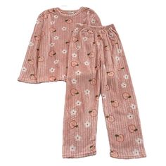 Gift yourself these adorable Strawberry Printed Velvet Pajama Set For Women and make your pajama collection more fruity. This pajama set is available in two colors pink, and purple. This pajama set is super comfortable to wear and just relax while you are about to end your day. The comfort is thanks to its full sleeve shirt and full-length pant. The floral design on the pajama set makes the whole outfit very adorable to look at. The blend of cotton and polyester makes it easy to clean and mainta Casual Sleepwear With Fruit Print For Loungewear, Cute Orange Sleepwear For Loungewear, Orange Long Sleeve Sleepwear For Sleepover, Orange Sleepwear For Pajama Party In Spring, Cute Loungewear Sets With Long Pants, Orange Sleepwear For Spring Sleepover, Peach Long Sleeve Sets For Spring, Pajama Collection, Full Sleeve Shirt