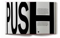 an open book with black and white designs on it's cover, which reads push