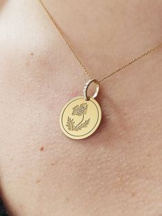 14K Moissanite Diamond Poppy Flower Pendant - Birth Flower Necklace - Gold Birth Month  Jewelry  The pendant in the image are 18mm/0.70 inches  Find all the information you need about your pendant: Material: 14K Solid Real Gold Stamp: 585 (14K) Pendant's Size: (5 sizes available) -      0.62 inches / 16mm (diameter) -0.70 inches / 18mm (diameter) -0.78 inches / 20mm (diameter) -0.86 inches / 22mm (diameter) -0.94 inches / 24mm (diameter) Pendant Thickness: 0.5mm Inner diameter of the jumpring: 7.5x5.5mm Gemstone: Total 8 Moissanite Diamonds Classic Moissanite White Round Brilliant Cut Faceted Clarity: VVS+ Color - D+ Hardness - 9.25 on Moh's scale FREE Backside Engraving Gift Box Included! Necklace Length: (thin and dainty) -Without Chain -16 inches / 40cm -18 inches / 45cm -20 inches / 50 Bohemian Jewelry Birth Flower Pendant, Yellow Gold Birth Flower Pendant Necklace, Gold Birth Flower Pendant Necklace, Yellow Birth Flower Pendant Necklace, 14k Gold-filled Birth Flower Pendant Necklace, Flower Necklace Gold, August Birth Flower, Poppy Necklace, White Gold Chains