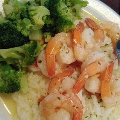 shrimp, broccoli and rice on a white plate