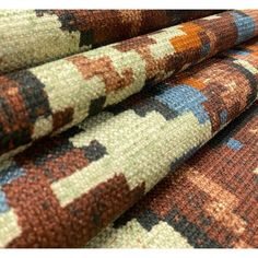 multicolored rugs with different patterns on them