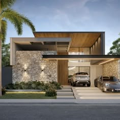 two cars parked in front of a modern house with stone walls and palm trees on the side