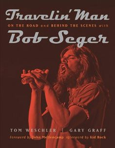 the book cover for traveling man on the road and behind the scenes with bob seger