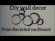 the words diy wall decor from recycled cardboard