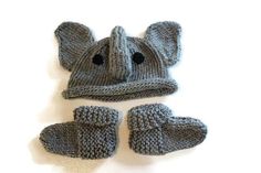 An elephant hat and booties set! An adorable hand-crafted baby hat and booties/socks. This hat is just right for a baby gift. Would be a great addition to your newborn's photo shoot.  Need that perfect baby gift? Need a prop for your gender reveal party? This is the set for you! Each hat is handmade with love. Hat and booties are gray, and the hat looks like an elephant head! It even has a trunk and big floppy ears! Fits: preemie 0-3 months Washing instructions: - We recommend washing on a gentl Newborn Crib, Elephant Hat, Sister Crafts, Girls Purse, Elephant Head, Newborn Photoshoot, Shower Gifts, Baby Elephant, New Parents