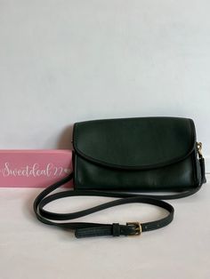 Vtg Coach Original  Sterling Clutch Green color leather with brass hardware Roomy interior with zip pocket covered by a flap and secured with a magnetic button Adjustable strap Strap drop 20"-24" Measures: 9.5"L, 7"H, 2"W Made in the United States #A4B-9455 Hang tag and chain Flaws: stain under flap and front that did not remove during cleaning Cleaned, conditioned and ready to wear! Questions? Just ask More vtg coach styles/colors also available G78 Luxury Coach Bag With Chain Detail, Luxury Coach Bags With Turn-lock Closure, Luxury Clutch Shoulder Bag By Coach, Coach Outlet Nylon Bags, Luxury Coach Clutch Shoulder Bag, Coach Cashin 29, Luxury Coach Clutch, Luxury Coach Evening Wallet On Chain, Scooter Bags