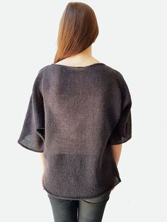 "This semitransparent knitted blouse features an oversized silhouette, subtle transparency, half-length sleeves and a cute boat neck - a classic combination of elegant details. Moreover, linen and mohair blend is a material that turns any pullover blouse into a completely versatile item that can be paired with almost anything. MATERIAL - 70% natural linen , 20% mohair and 10% acrilan. If you are allergic to any of these materials, please don't buy the product. Feel free to choose other yarn (suc One Size Knitted Tops With Batwing Sleeve, Open Knit Tops For Layering, Oversized Open Knit Tops For Layering, Oversized Knitted Top With Batwing Sleeves, Open Knit Batwing Sleeve Tops, Oversized Knitted Top For Layering, One Size Textured Knit Crew Neck Top, Knitted Slouchy Tops, Oversized Black Open Knit Top