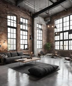 Cozy vintage minimalist industrial room with neutral tones and warm lighting. Industrial Living Room Design, Brick Living Room, Industrial Style Living Room, Industrial Living Room, Leather Couches, Brick Interior Wall, Brick Interior, New York Loft, Industrial Living