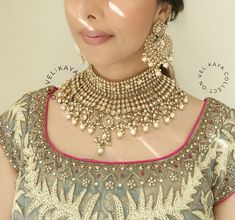 Our new antique gold bridal set is bigger and shinier than ever. If you are going for a royal Jodha look, this is the set you need! Check out the video to see it sparkle under natural light. No artificial lighting or filters used. The sparkle is real!  The antique gold plating and champagne stones make it a versatile piece that will look great with any color outfit! Product Details: * Necklace -  Comes with adjustable zari cord.  * Earrings - For pierced ears. Length - 8.5 cm approx * Mang Tika * Color - Antique gold with cream faux pearls, as shown in pictures. Please note color may vary a little due to digital image limitations. All our sets come in beautiful ready to gift boxes. Complete your look with custom Bridal Bangle set : https://www.etsy.com/ca/shop/VelikayaCollection?ref=simple Elegant Gold Lehenga With Intricate Design, Gold Sets With Intricate Design For Reception, Gold Sets With Tilla For Reception, Gold Temple Jewelry Sets For Reception, Gold Bridal Sets With Zari Work For Reception, Gold Hand Set Lehenga For Reception, Gold Hand-set Lehenga For Reception, Heavy Gold Lehenga For Reception, Jodha Look