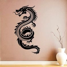 a wall decal with a black dragon on it