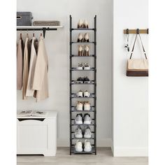 the shoe rack is holding several pairs of shoes