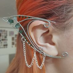 Intricate wire wrap elf/fairy ears. These are ear cuffs and don't require pierced ears. The metal is malleable and can be adjusted slightly to fit your own ear securely.  The beads come in two colours - green and bronze. The green beads are small crystal beads. They come in a pair, are lightweight and are easy to wear. Shipped only within the UK. Fae Ear Jewelry, Wired Elf Ears, Elven Wire Wrapped Jewelry, Elf Wire Ears, Elf Ears Jewelry, Elven Ear Cuffs, Wire Wrap Elf Ears, Adjustable Fantasy Wrap Earrings As Gift, Adjustable Fantasy Wrap Earrings For Gift