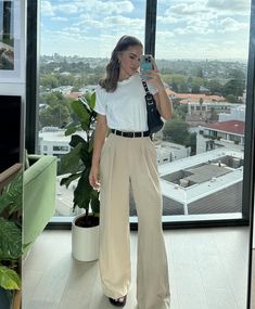 This post shows you the best beige pants outfit ideas. Wondering how to style beige pants? It's such a versatile piece of clothing and can easily be dressed up and down. This post shows you Beige Wide-leg Parachute Pants For Work, Beige Trousers Outfit Casual, Nude Pants Outfit, Beige Casual Wide-leg Parachute Pants, Elegant Beige Wide-leg Pants, Casual Beige Wide-leg Parachute Pants, Beige Cotton Pants With Pull-on Style, Tan Pants Outfit, Trousers Outfit Casual