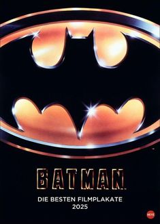 the batman movie poster is shown in black and gold with an orange glow on it