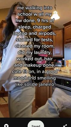 a woman standing in front of a stove top oven next to a kitchen with wooden cabinets