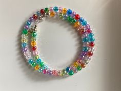 Beaded Necklace. 6mm faceted acrylic iridescent beads. Round clear bubblegum glitter beads. 18in with heart charm and lobster claps closure. Chewing Gum, Beaded Necklaces, Chain Styles, Heart Charm, Favorite Jewelry, Necklace Etsy, Gum, Seattle, Beaded Necklace