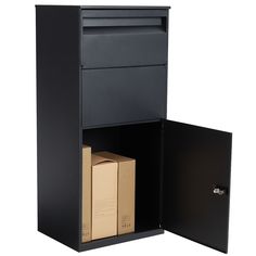 an open file cabinet with cardboard boxes in front of it and the door opened to reveal a box