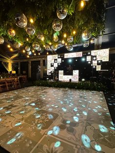 a dance floor with lights and decorations on it