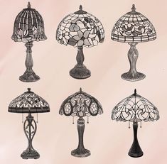 an assortment of stained glass table lamps on a pink background, including one with a floral design