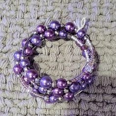 Nwot Purple Faux Pearl Wire Cuff Stretchy Multi Bracelet One Size Will Fit Up To 7.5in Wrist Beautiful Purple Beads Never Worn Please See Photos Comes From A Dog Friendly And Smoke Free Home. Handmade Silver Wrap Bracelet For Party, Purple Metal Bracelet For Party, Purple Metal Bracelets For Party, Adjustable Silver Stretch Bracelet For Party, Elegant Purple Stretch Bracelet For Party, Adjustable Purple Bracelets For Party, Purple Beaded Metal Bracelets, Elegant Purple Metal Beaded Bracelets, Silver Beaded Wrap Bracelet For Party