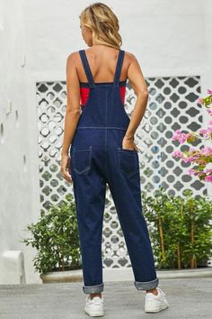 Grommet Detail Dark Blue Denim Overall Casual Blue Denim Jumpsuit For Work, Blue Non-stretch Casual Overalls, Casual Blue Non-stretch Denim Jumpsuit, Blue Denim Jumpsuit With Pockets, Casual Navy Denim Jeans, Blue Overalls With Pockets For Fall, Blue Fall Overalls With Pockets, Fall Blue Overalls With Pockets, Casual Blue Denim Jumpsuit