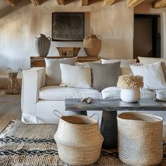 Textural Mediterranean living room with a focus on incorporating woven baskets for a cozy and inviting feel Wabi Sabi Living Room