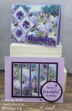 a card with purple flowers and the words thanks on it