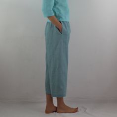 "Women linen pants with 2 pockets in grayish blue color, perfect for casual wear and suitable for any occasion in any season Details: - 100% natural linen produced in Europe ; - medium weight (180 gram per square meter); - color: grayish blue, can be any from our colors catalogue (color samples at the photo); Made to order, approximately a few days, If you have any questions please message me and I will be glad to answer. Size guide : Size XS Bust: fits bust around 33\"-34\"/ 84-88 cm Waist: fit Blue Linen Wide-leg Pants, Casual Turquoise Wide Leg Bottoms, Blue Linen Relaxed Fit Pants, Blue Relaxed Fit Linen Pants, Blue Linen Pants For Loungewear, Blue Linen Loungewear Pants, Blue Linen Lounge Pants, Summer Blue Linen Pants, Casual Turquoise Summer Pants