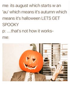 a man in a suit and tie with a pumpkin on his head