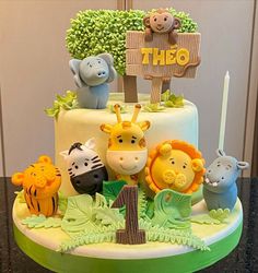 a birthday cake with animals on it