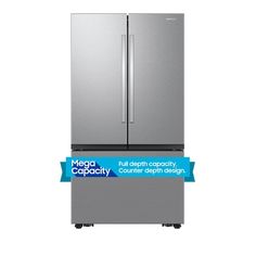 a silver refrigerator freezer sitting on top of a white wall with a blue ribbon around it