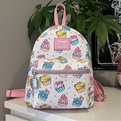 Loungefly Hello Kitty And Friends Sweets Mini Backpack From Claire’s Nwot, Never Used And Perfect Condition Cute Everyday Backpack With Cute Design, Cute Backpack With Adjustable Strap, White Backpack With Cute Design, Cute Backpack For Everyday Use, Playful White Bag With Zipper Closure, Cute Standard Backpack, Playful White Bag With Cute Design, White Backpack With Adjustable Strap As Gift, Kawaii White Backpack For Everyday Use