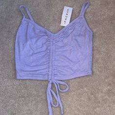 Lavender Cropped Tank With Tie Cinch Detail From Pacsun, Size Xs Nwt Lavender Summer Vacation Top, Drawstring Tank Top For Beach In Spring, Lavender Summer Top For Vacation, Lavender Summer Tops For Vacation, Spring Cotton Drawstring Tank Top, Purple Crop Top For Beach, Spring Season, Trendy Lavender Tops For Beach, Spring Beach Purple Crop Top, Lavender Beach Tops For Spring