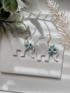 About 1.25 inch large elephants with blue flowers Elephant Clay Earrings, Elephant Clay, Polymer Clay Elephant, Clay Elephant, Diy Earrings Polymer Clay, Elephant Earrings, Earrings Polymer, Earrings Polymer Clay, Diy Earrings