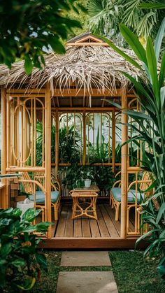 a wooden gazebo surrounded by plants and greenery