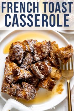 french toast casserole on a plate with powdered sugar