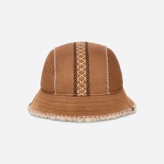 We're in stitches over how cute the Atherson Embroidered Hat is. Made with genuine sheepskin, this lovable bucket hat is primed for warmth. | Sheepskin bucket hat. Self - 100% Sheepskin. Lining - Unlined. Hand sewn and embroidered. UGG®braid embroidery detail. UGG® leather license plate label. Imported. | UGG® Women's Atherson Embroidered Hat Sheepskin Hats in Chestnut, Size L/XL Braid Embroidery, Ugg Leather, Leather Hat, Embroidered Hat, Leather Hats, Hat For Women, Embroidered Hats, Slipper Sandals, Cold Weather Accessories