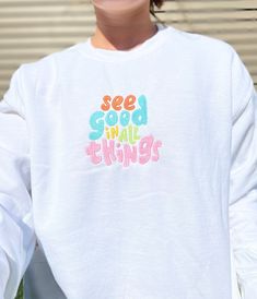 see good in all things embroidered crewneck/hoodie cute colorful embroidery trendy gildan crewneck/hoodie 5x7 inches Trending Crewneck Designs, Hoodies With Embroidery, Trendy Multicolor Cotton Sweatshirt, Cute Cotton Sweatshirt With Embroidered Graphics, Trendy Sweatshirt With Letter Embroidery For Spring, Spring Casual Sweatshirt With Embroidered Graphics, Casual Embroidered Sweatshirt For Spring, Trendy Top With Custom Embroidery For Spring, Cute Cotton Sweatshirt With Custom Embroidery