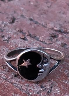 Smiling crescent moon Looking at a star Sterling silver (tested) Good weight - 2 grams Size currently 5.5 (see sizer photo) BUT is adjustable Beautiful craftsmanship Provenance: early-mid1990s Stamp: Picasso 20220115J1079 Condition: Very good vintage. No issues to report. We've not polished it, just wiped with soft jeweler's cloth, leaving polishing to future owner, as desired. See pics. Sold as is. Materials: sterling silver Measurements: Signet size - .25 x 3/8 inches (.63 x .95cm) Weight 2 gr Czech Glass Necklace, Vintage Designer Jewelry, Crescent Moon, Crescent, Vintage Shoes, Artisan Jewelry, Rings Statement, Antique Jewelry, Statement Rings