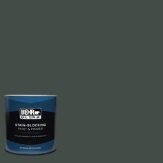 a can of behrut ultra stain - blocking paint on a gray background with the words