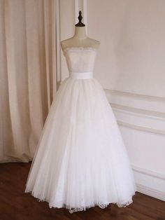 A Line Strapless White Tulle Long Prom Dresses #promdress #promdresses #whitepromdress #formaldress #eveningdress Prom Dress Tulle, Tea Length Prom Dress, White Prom, Lace Bridesmaid Dress, Strapless Prom Dress, Lace Bridesmaids, White Prom Dress, Dress Tulle, Formal Party Dress