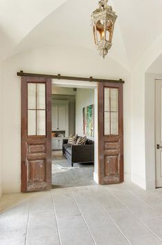 an open door leading into a living room