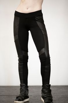 Black leggings/tights made out of combination of 2 different lycra fabrics, designed with leather stripes. The model on the picture is wearing size S. Normal wash. Collection 'DISTRESSOR' Spring '21 Black Stretch Leather Pants For Streetwear, Fitted Black Leather Pants In Alternative Style, Fitted Alternative Style Leather Pants, Fitted Gothic Leather Pants For Streetwear, Black Gothic Leather Pants For Streetwear, Edgy Stretch Leather Pants For Streetwear, Fitted Punk Leggings For Cosplay, Edgy Stretch Pants For Alternative Fashion, Gothic Black Leggings For Streetwear