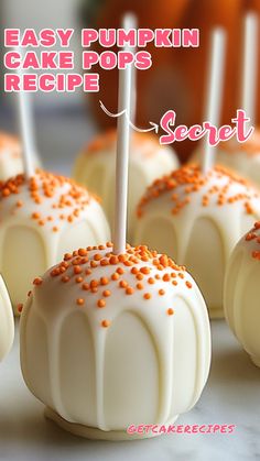 white cake pops with orange sprinkles on them