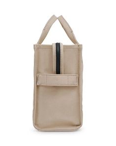 The Medium Cotton Canvas Tote is the ideal bag for all your Instagram adventures. With a spacious main compartment, interior pockets, and removable crossbody strap for hands-free snapping, it keeps your essentials organized while exploring. Dual handles and a zip closure keep items secure, while its unlined design makes it lightweight enough for all-day wear. At just over 13 inches wide, it fits all your gear from DSLR to travel mug. Make memories on-the-go with this versatile tote as your styli Travel Box Bag With Detachable Handle In Coated Canvas, Travel Box Bag With Adjustable Top Handle, Crossbody Box Bag In Coated Canvas With Detachable Strap, Coated Canvas Box Bag With Detachable Strap Crossbody, Coated Canvas Crossbody Box Bag With Detachable Strap, Beige Box Bag With Adjustable Handle For Travel, Travel Box Bag With Detachable Strap In Coated Canvas, Modern Shopping Box Bag With Zipper Closure, Travel Box Bag With Double Adjustable Handle