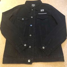 Size Large, Never Worn. Huge Tbs Patch On Back, Patches On Front. Individual Buttons All Have Taking Back Sunday Engraved On Them. Super Awesome Jacket. Please See All Photos! Bought It For My Boyfriend But Was Too Small On Him And I Couldn’t Return It! There Is A Small White Mark On The Back But Will Come Out Easily. Black Cotton Denim Jacket For Work, Black Denim Jacket With Snap Buttons For Work, Black Denim Outerwear With Snap Buttons, Black Button-up Denim Jacket For Streetwear, Urban Black Fitted Denim Jacket, Black Fitted Urban Denim Jacket, Fitted Black Cotton Denim Jacket, Edgy Button-up Cotton Outerwear, Edgy Cotton Button-up Outerwear