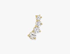 Made with lab grown diamonds and 14k solid gold, this earring is designed to be worn solo as a statement of individuality. Shop VRAI earrings. Ear Climber, Solid Gold Earrings, Tiny Diamond, Bezel Diamond, Accessories Jewelry Earrings, Cuff Earrings, Fine Jewellery Earrings, Diamond Sizes, Elegant Earrings