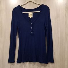 *Nwt Chaser Long Sleeve Henley With 3 Silver Functional Buttons And Short Slits On Sides With Waffle Texture To It. *Size: Small *Color: Navy Blue *Ptp: 16.5" And Length: 26.5" ***No Material Contents*** Everyday Long Sleeve Henley With Buttons, Casual Blue Long Sleeve Henley, Henley Shirt Women, Blue Long Sleeve Wrinkle-resistant Shirt, Blue Wrinkle-resistant Long Sleeve Shirt, Thrift Wishlist, Henley Long Sleeve, Pretty Fits, Cotton Henley Neckline T-shirt With Buttons